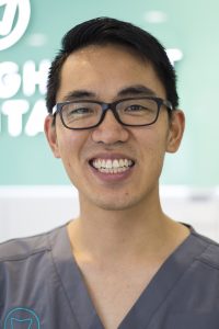 Dr Gordon Cheung, smiling dentist.