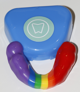 Rainbow striped mouthguard with mouthguard case